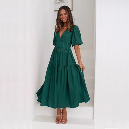 Jurk met pofmouwen en getailleerde taille - By LAQUEZ.