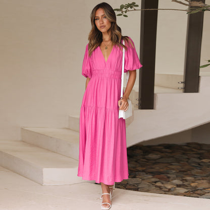 Jurk met pofmouwen en getailleerde taille - By LAQUEZ.