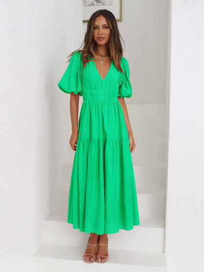 Jurk met pofmouwen en getailleerde taille - By LAQUEZ.